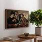 The Cardsharps, c. 1594 by Caravaggio, presented in a walnut floater framed canvas featuring two men cheating at cards while a third figure secretly observes behind them, displayed above a hallway console table.