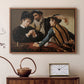 Walnut floater framed canvas featuring a young men playing cards with one cheating and another watching closely, displayed above a cabinet in a soft-toned living room.