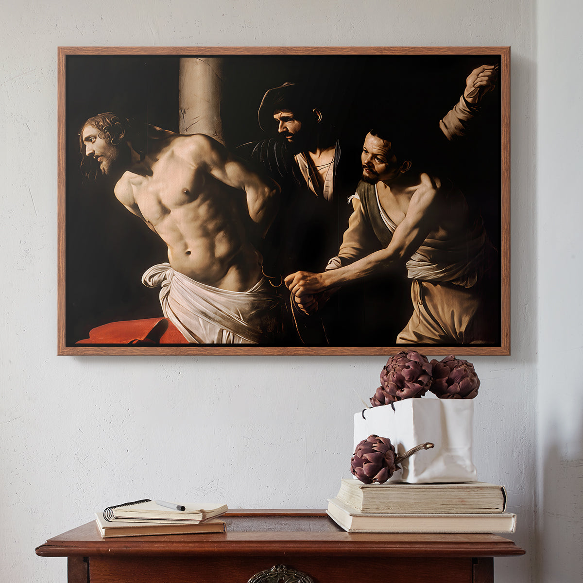 Walnut floater framed canvas featuring The Flagellation of Christ at the Column (Rouen Version), 1606 by Caravaggio above an entryway table in a minimalist foyer.