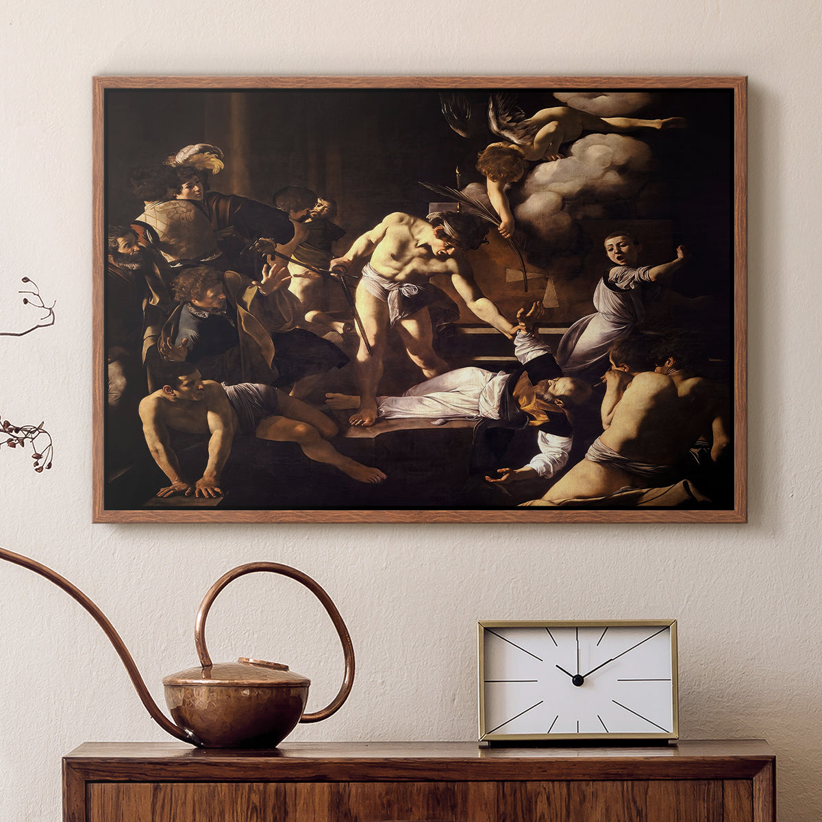 Walnut floater framed canvas featuring a religious narrative showing violent attack on saint in crowded setting, displayed above a cabinet in a soft-toned living room.