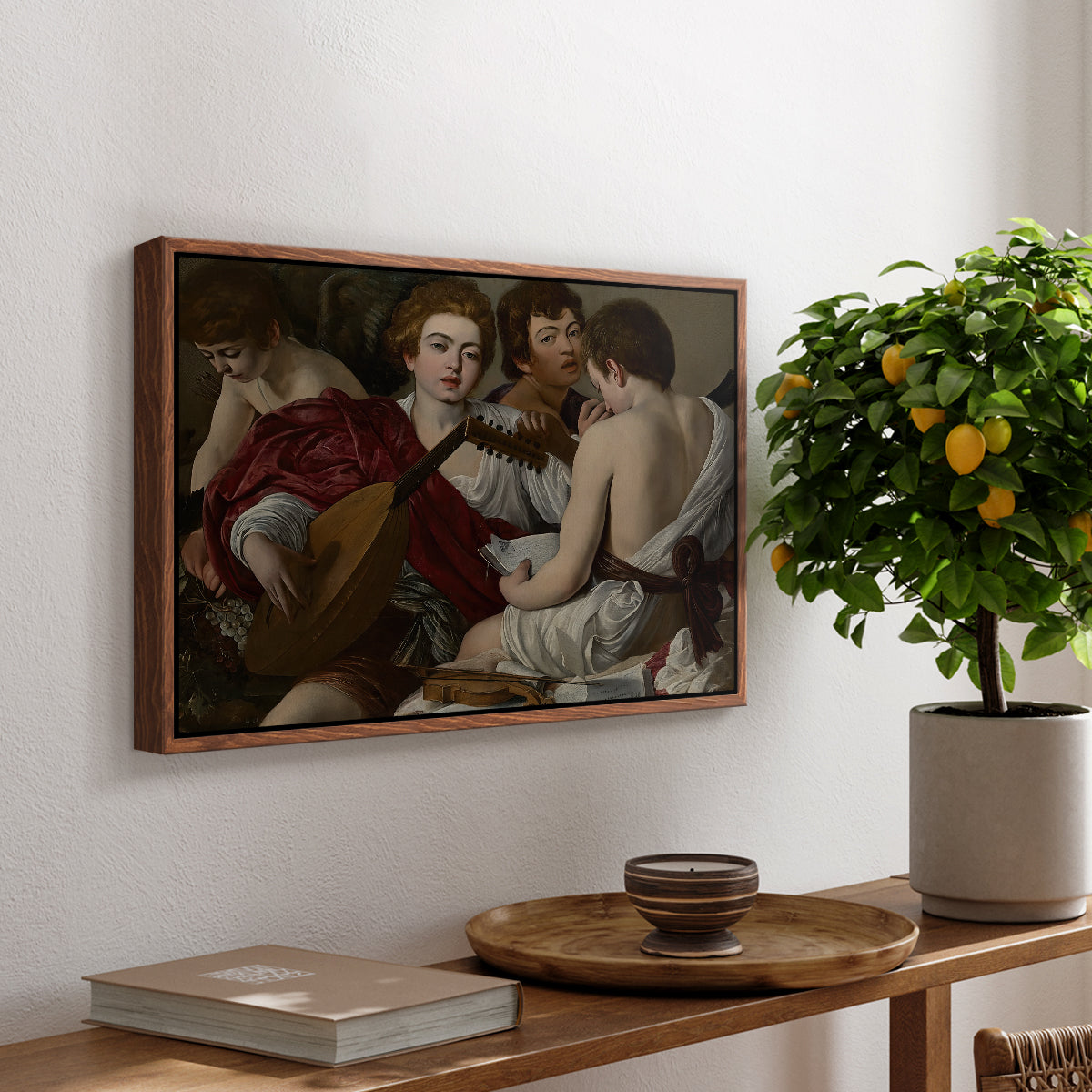 The Musicians, c. 1595 by Caravaggio, presented in a walnut floater framed canvas featuring a group of young men gathered together playing music with instruments, displayed above a hallway console table.