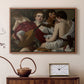 Walnut floater framed canvas featuring an intimate scene of youths making music with sheet music and instruments, displayed above a cabinet in a soft-toned living room.