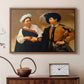 Walnut floater framed canvas featuring a close interaction between two figures involving deception and gesture, displayed above a cabinet in a soft-toned living room.