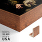 Close-up of the walnut floater frame corner and gallery wrapped canvas construction.
