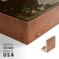 Close-up of the walnut floater frame corner and gallery wrapped canvas construction.