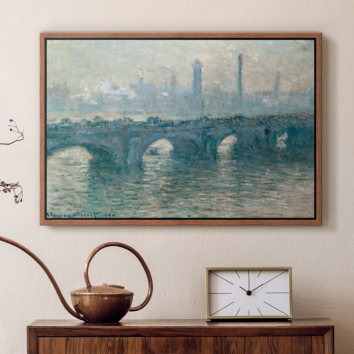 Walnut floater framed canvas featuring a soft-toned river scene with bridge and muted skyline, displayed above a cabinet in a soft-toned living room.