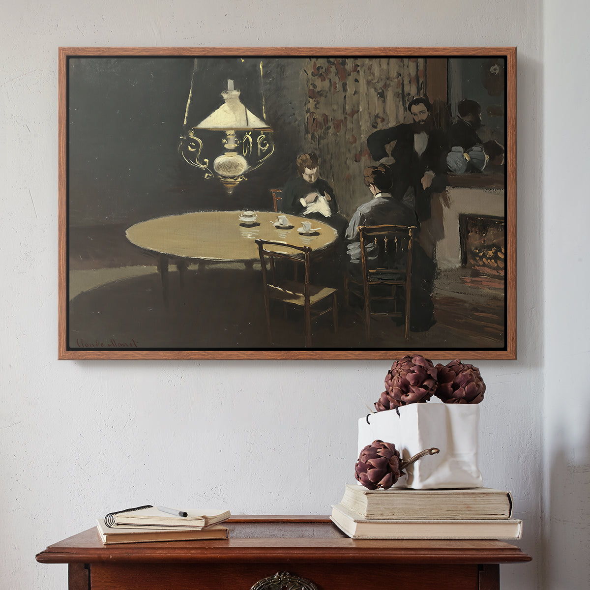 Walnut floater framed canvas featuring Interior, after Dinner, 1868-1869 by Claude Monet above an entryway table in a minimalist foyer.