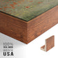 Close-up of the walnut floater frame corner and gallery wrapped canvas construction.