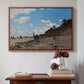 Walnut floater framed canvas featuring The Beach at Honfleur, 1864 by Claude Monet above an entryway table in a minimalist foyer.