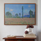 Walnut floater framed canvas featuring Poppy Field (Giverny), 1890-1891 by Claude Monet above an entryway table in a minimalist foyer.