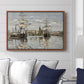 Ships Riding on the Seine at Rouen, 1872 by Claude Monet displayed above a sofa in a living room in a walnut floater frame, featuring an impressionist river scene with anchored sailing ships and reflections.