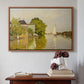 Walnut floater framed canvas featuring Houses on the Achterzaan, 1871 by Claude Monet above an entryway table in a minimalist foyer.