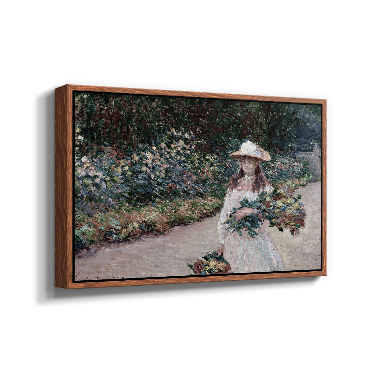 Angled view of Young Girl in the Garden at Giverny, 1888 by Claude Monet in a walnut floater framed canvas.
