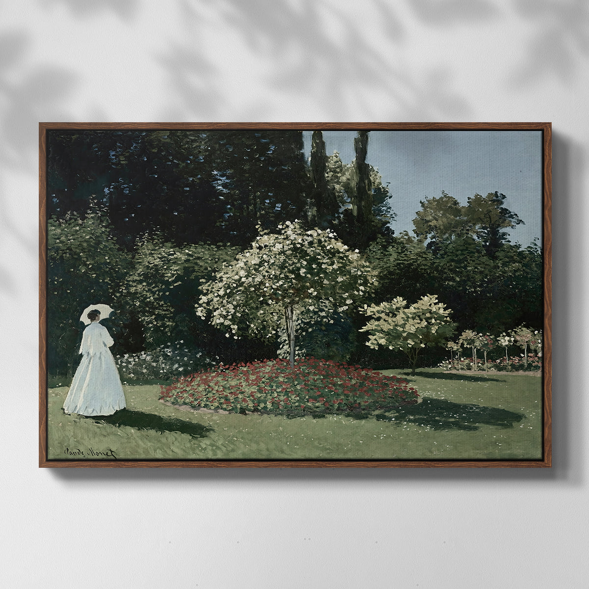Front view of Woman in the Garden, Sainte-Adresse, 1867 by Claude Monet in a walnut floater framed canvas.