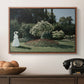 Woman in the Garden, Sainte-Adresse, 1867 by Claude Monet in a walnut floater framed canvas displayed above a console table in a hallway, featuring a tranquil garden portrait with soft natural light.