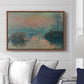 Sunset on the Seine at Lavacourt, Winter Effect, 1880 by Claude Monet displayed above a sofa in a living room in a walnut floater frame, featuring a winter scene with warm light reflecting on water at dusk.