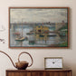Walnut floater framed canvas featuring a calm water scene with bridge fading into cloudy sky, displayed above a cabinet in a soft-toned living room.