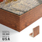 Close-up of the walnut floater frame corner and gallery wrapped canvas construction.