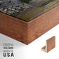Close-up of the walnut floater frame corner and gallery wrapped canvas construction.