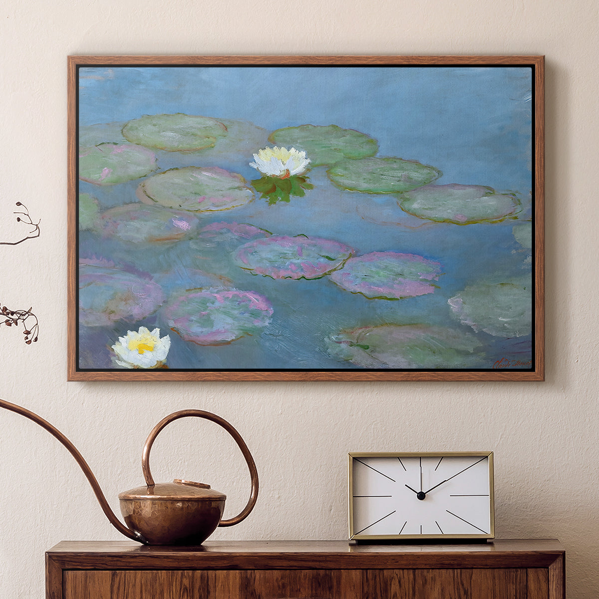 Walnut floater framed canvas featuring a tranquil water surface covered with blooming lilies, displayed above a cabinet in a soft-toned living room.