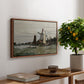 Windmill at Zaandam, 1871 by Claude Monet, presented in a walnut floater framed canvas featuring a single windmill beside water with surrounding buildings and sky, displayed above a hallway console table.