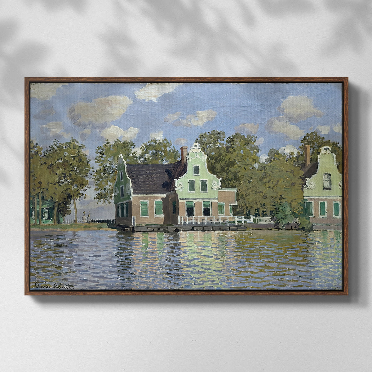 Front view of Houses on the Zaan River at Zaandam, 1871 by Claude Monet in a walnut floater framed canvas.