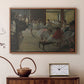 Walnut floater framed canvas featuring an impressionist studio interior filled with ballet students, displayed above a cabinet in a soft-toned living room.