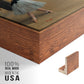 Close-up of the walnut floater frame corner and gallery wrapped canvas construction.