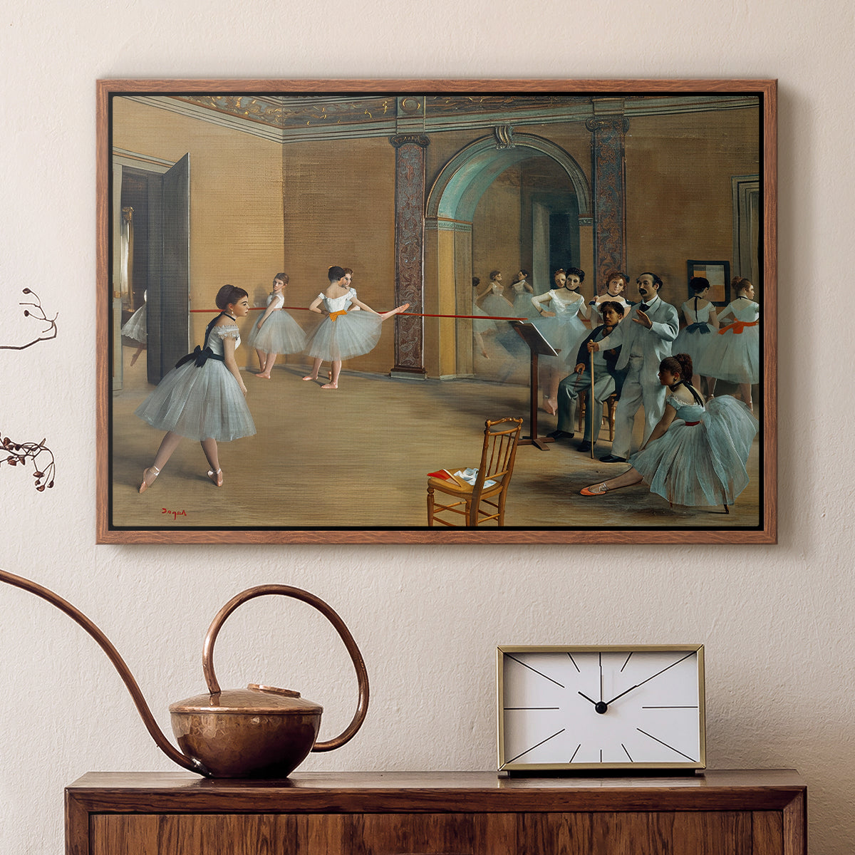 Walnut floater framed canvas featuring an impressionist depiction of ballet foyer with multiple figures, displayed above a cabinet in a soft-toned living room.