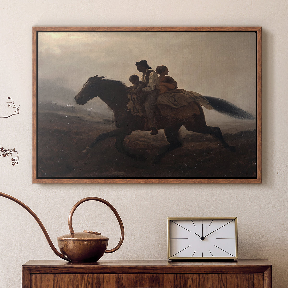 Walnut floater framed canvas featuring a narrative painting of escape and urgency across rugged terrain, displayed above a cabinet in a soft-toned living room.