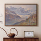 Walnut floater framed canvas featuring a realistic depiction of high-altitude snowy peaks, displayed above a cabinet in a soft-toned living room.