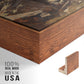 Close-up of the walnut floater frame corner and gallery wrapped canvas construction.