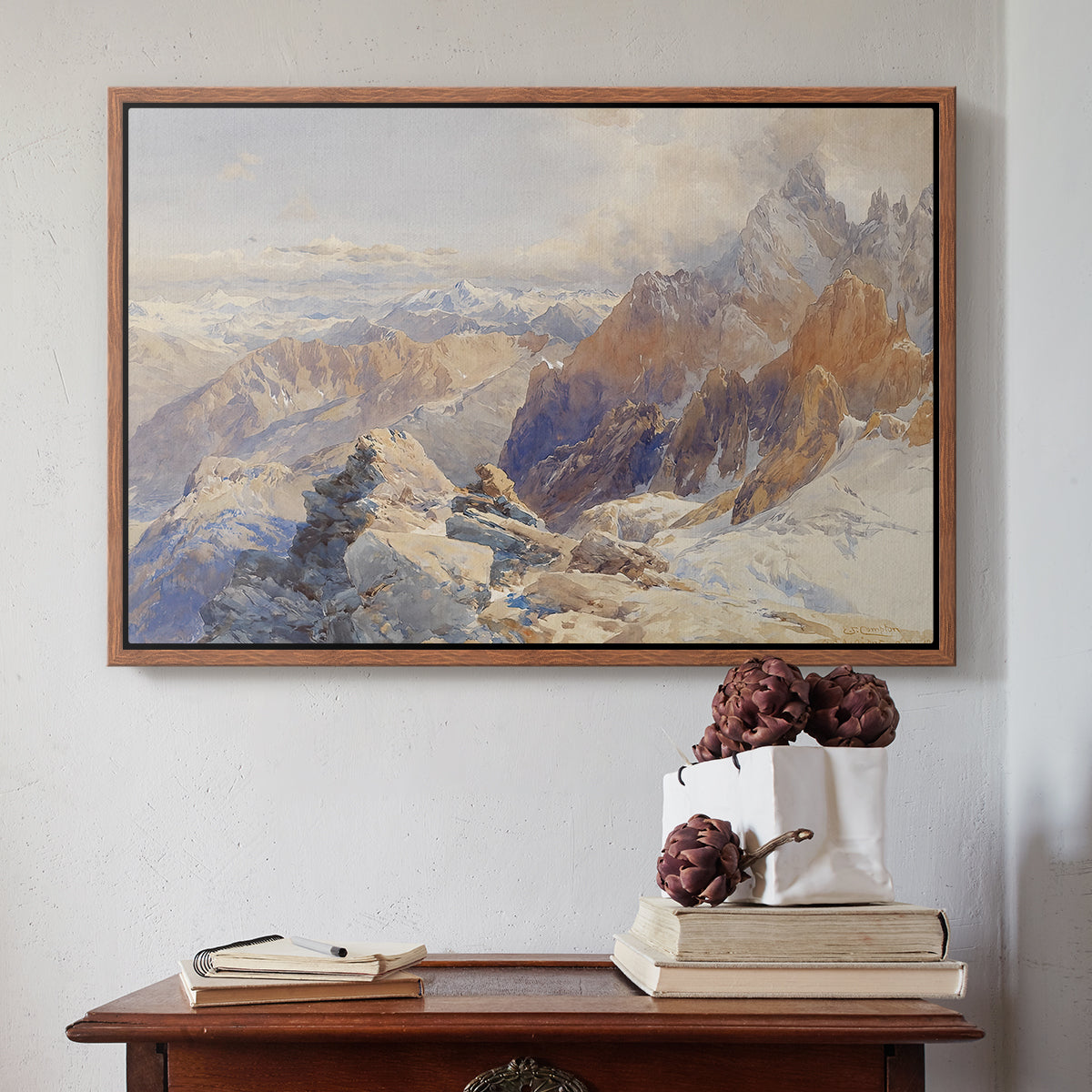 Walnut floater framed canvas featuring Col du Géant, 1903 by Edward Theodore Compton above an entryway table in a minimalist foyer.