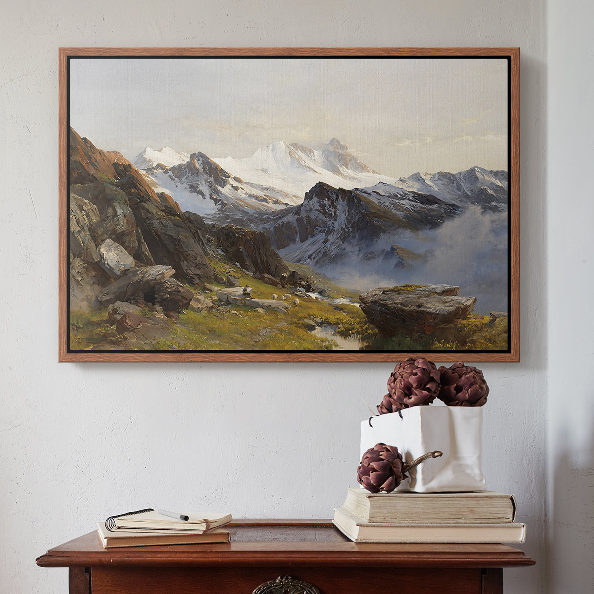 Walnut floater framed canvas featuring The Großglockner from the Prager Hut, 1890 by Edward Theodore Compton above an entryway table in a minimalist foyer.