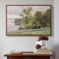 Walnut floater framed canvas featuring Landscape at Lake Starnberg, 1890 by Edward Theodore Compton above an entryway table in a minimalist foyer.