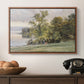 Landscape at Lake Starnberg, 1890 by Edward Theodore Compton in a walnut floater framed canvas displayed above a console table in a hallway, featuring a tranquil lakeside view with soft atmospheric tones.