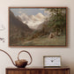 Walnut floater framed canvas featuring a natural scene with valleys and rocky formations, displayed above a cabinet in a soft-toned living room.