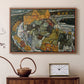 Walnut floater framed canvas featuring an expressionist depiction of island town with geometric forms, displayed above a cabinet in a soft-toned living room.
