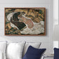 Death and the Maiden, 1915 by Egon Schiele displayed above a sofa in a living room in a walnut floater frame, featuring a symbolic scene of mortality with two figures clinging together.