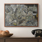 Mödling II, 1918 by Egon Schiele in a walnut floater framed canvas displayed above a console table in a hallway, featuring a stylized urban composition with geometric structures and muted tones.