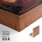 Close-up of the walnut floater frame corner and gallery wrapped canvas construction.