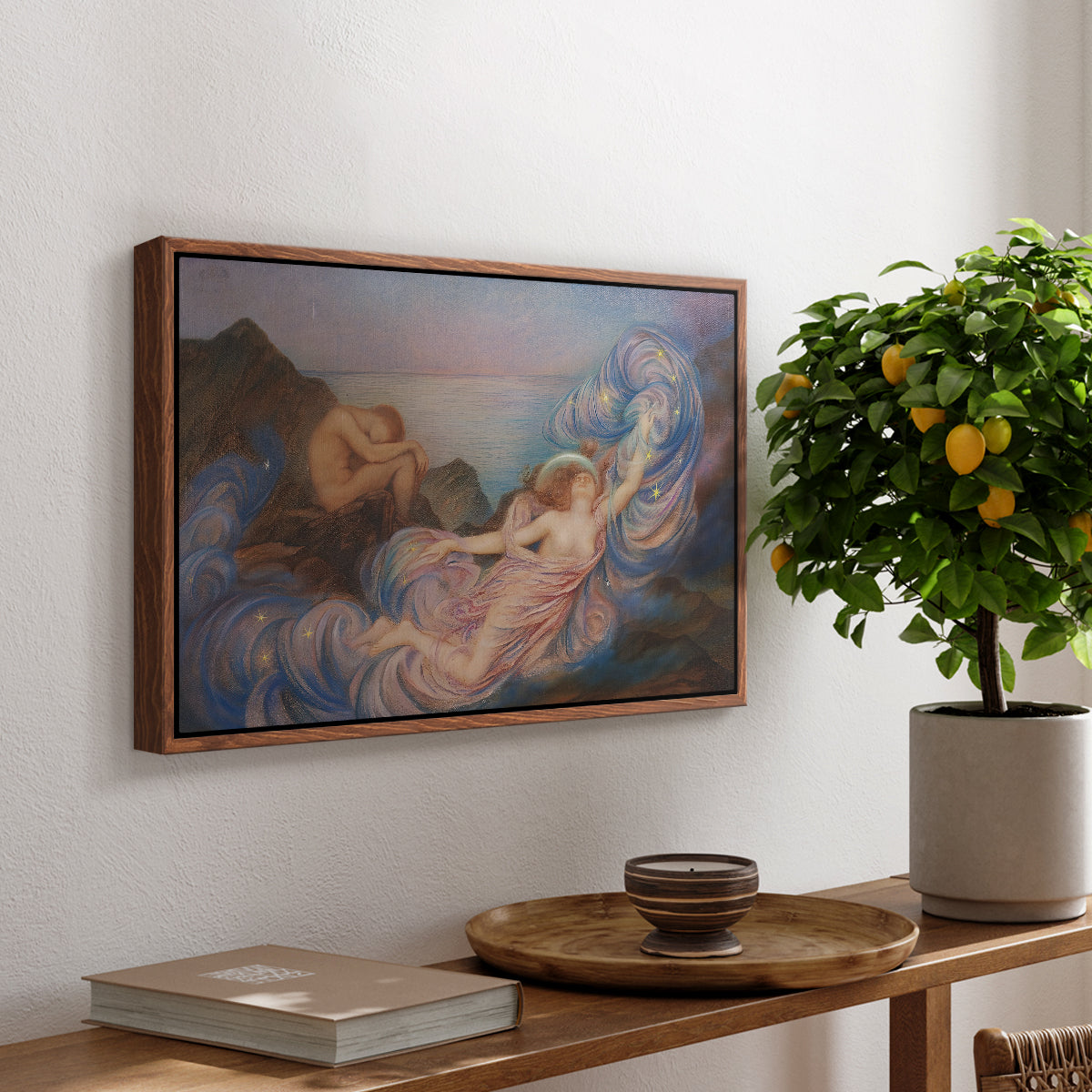 Twilight, 1914 by Evelyn De Morgan, presented in a walnut floater framed canvas featuring a reclining female figure beneath glowing sky at twilight with soft colors, displayed above a hallway console table.