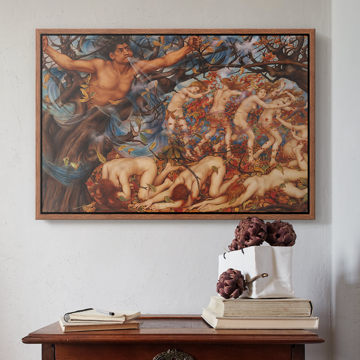 Walnut floater framed canvas featuring Boreas and the Fallen Leaves, c. 1910-1914 by Evelyn De Morgan above an entryway table in a minimalist foyer.