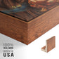 Close-up of the walnut floater frame corner and gallery wrapped canvas construction.