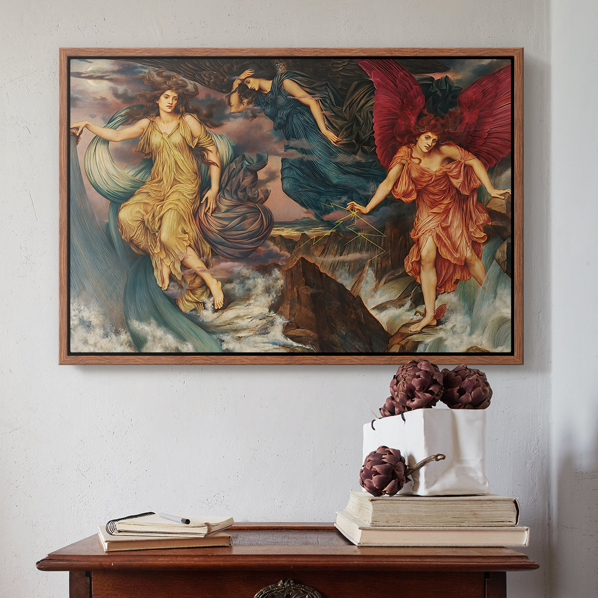 Walnut floater framed canvas featuring The Storm Spirits, 1900 by Evelyn De Morgan above an entryway table in a minimalist foyer.