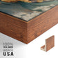 Close-up of the walnut floater frame corner and gallery wrapped canvas construction.