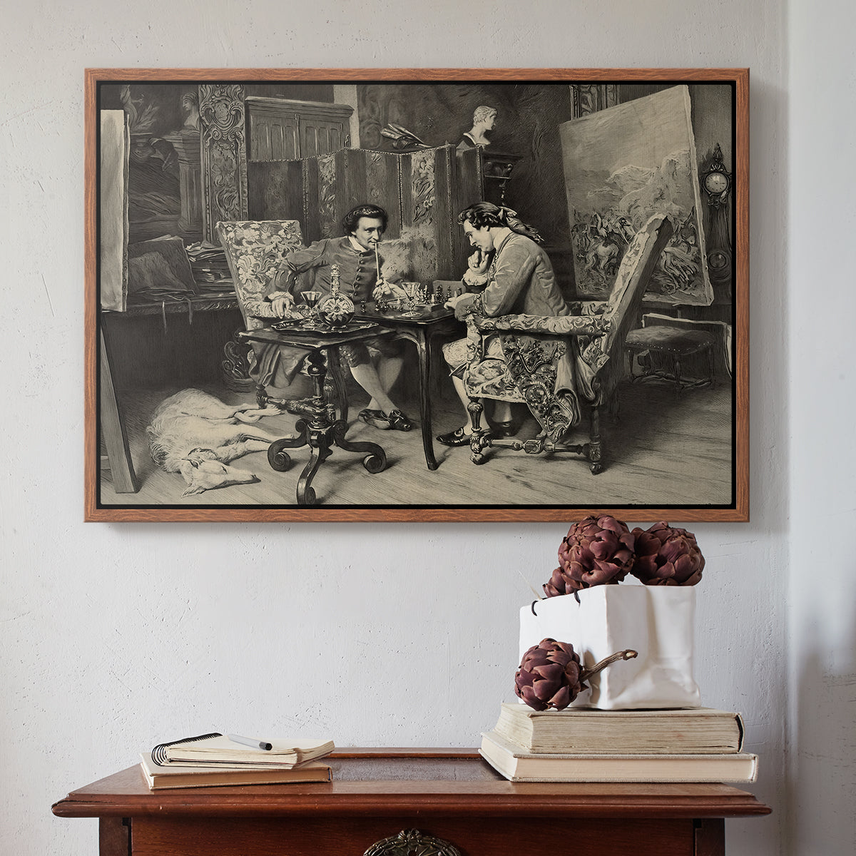 Walnut floater framed canvas featuring The Chess Players, 1858 by Ernest Meissonier above an entryway table in a minimalist foyer.