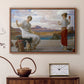 Walnut floater framed canvas featuring a classical scene of figures winding thread together, displayed above a cabinet in a soft-toned living room.