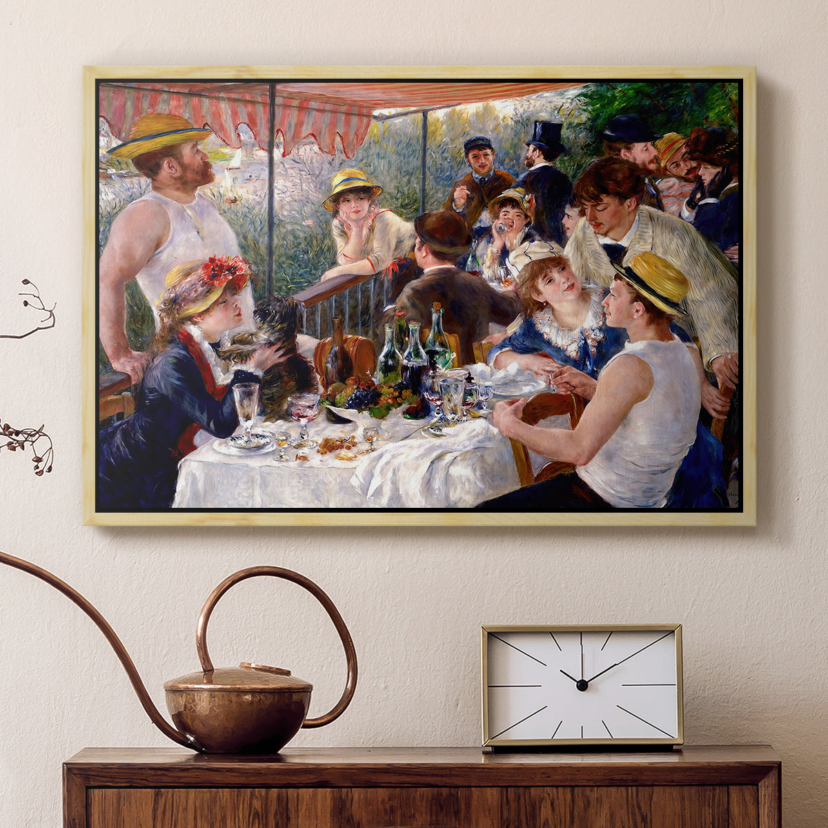 Natural wood floater framed canvas featuring an impressionist scene of friends enjoying lunch with wine and conversation, displayed above a cabinet in a soft-toned living room.