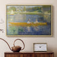 Natural wood floater framed canvas featuring a couple seated in boat on river surrounded by soft reflections, displayed above a cabinet in a soft-toned living room.